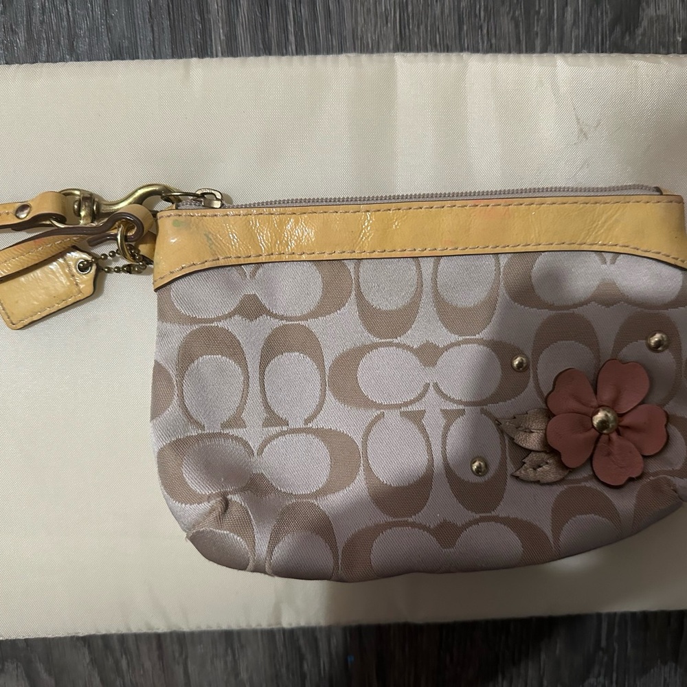 Coach Beige Signature Canvas Wristlet with Yellow Trim & Pink Flower